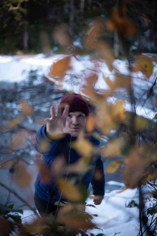 an image of man with the hand up for a picture