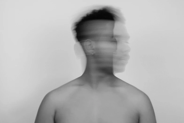 an individual is viewed through the blurry image