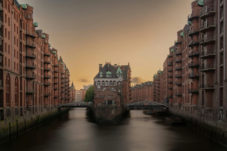 a bridge that goes into a canal in a city