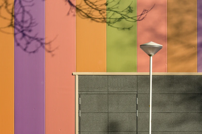a tennis court has an abstract rainbow background