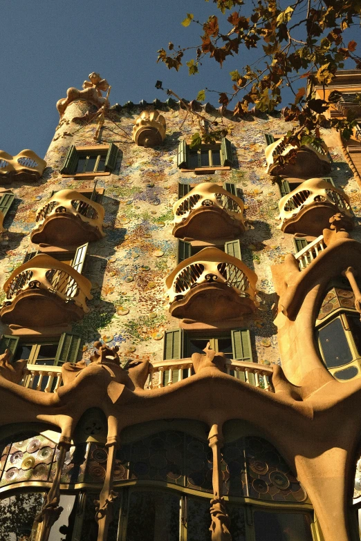 an old building with lots of windows and balconies