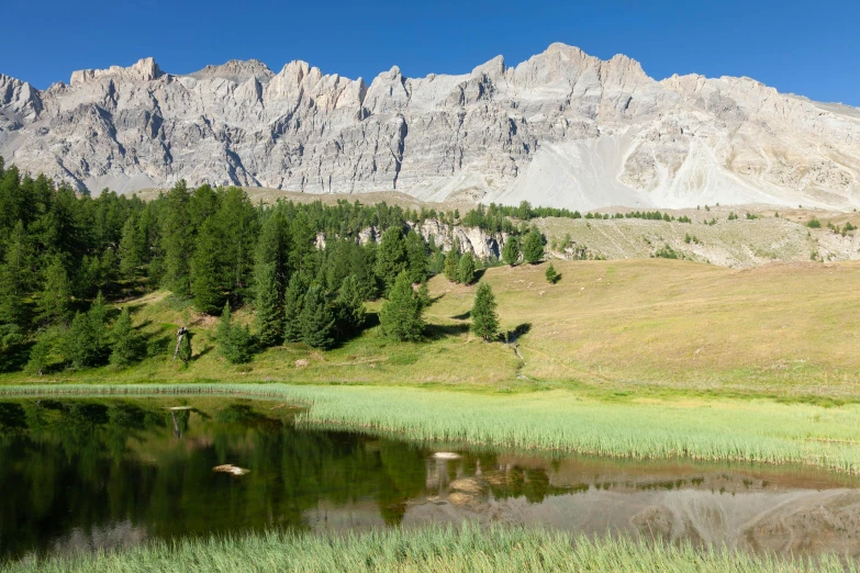 this is a lake next to a mountain range