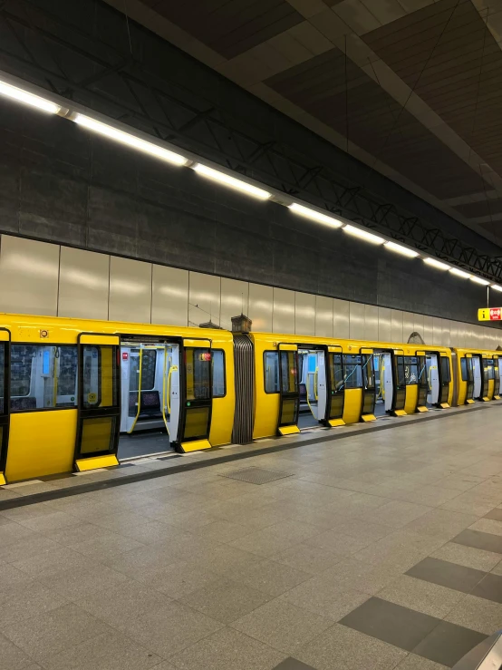 there are many yellow and white train stations