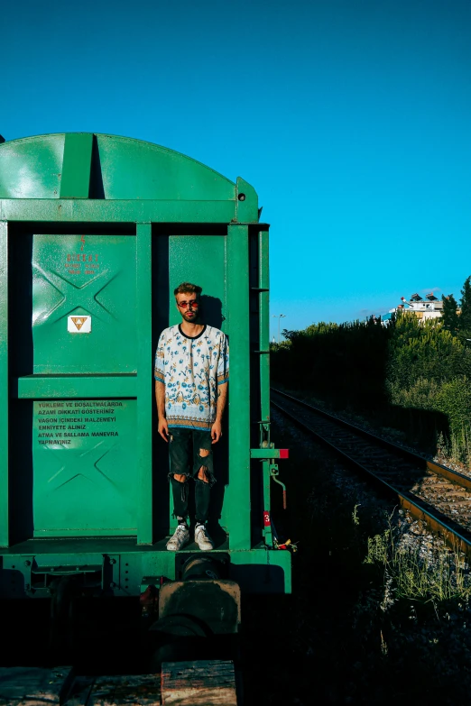 there is a person standing in a train caboose