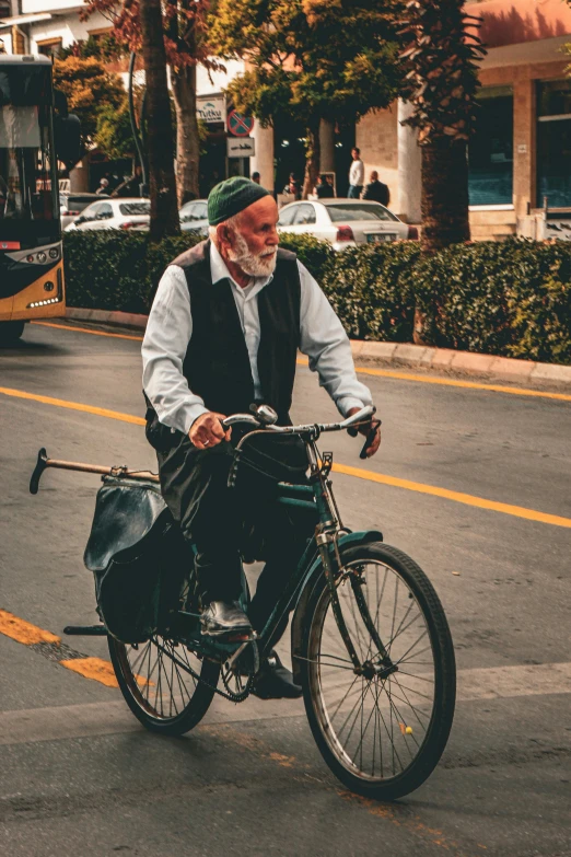 a man is on his bike in the parking lot