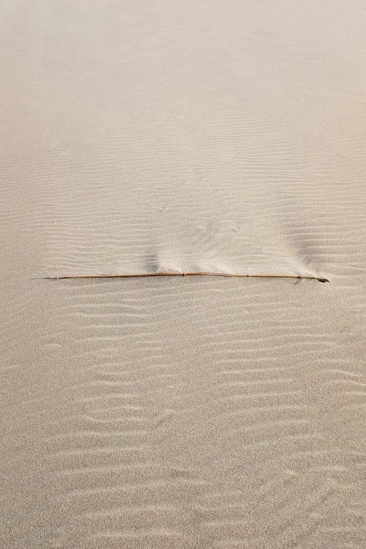 there is a sand pattern at the beach