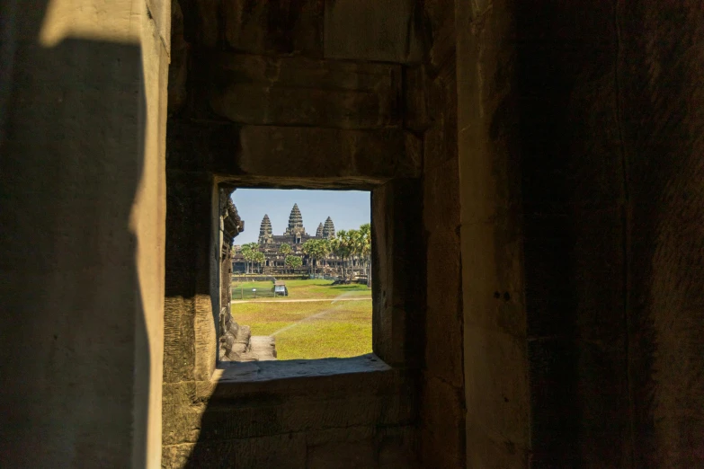 a view out the window at some buildings