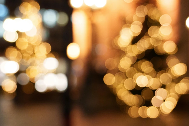 a blurred po of a street filled with lights