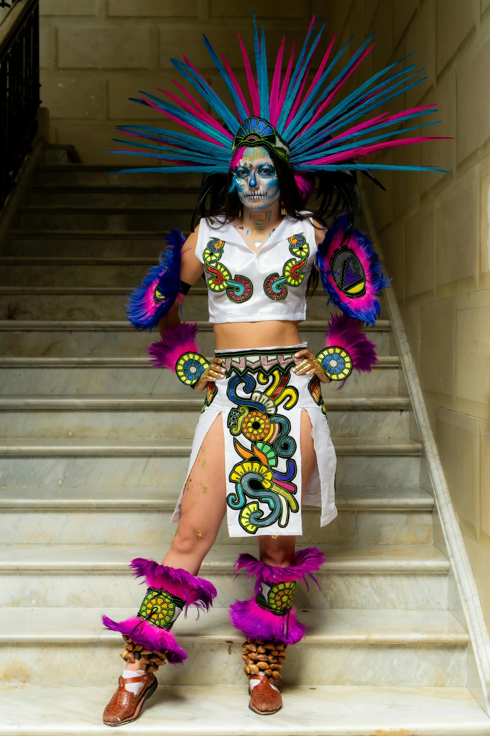 the woman is posing for a po on the stairs