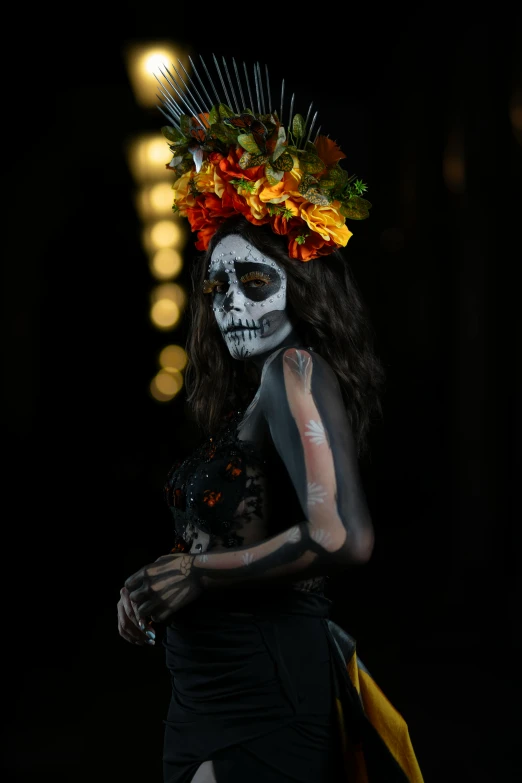 a woman dressed as the day of the dead