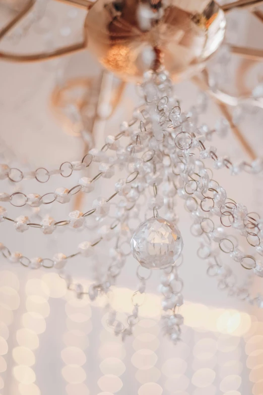 the chandelier hangs on the ceiling of the room