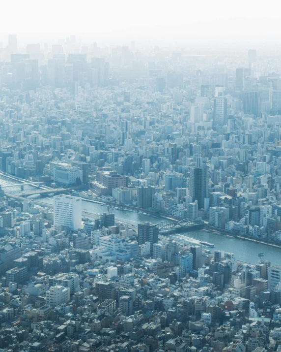 a city with river and a big bridge