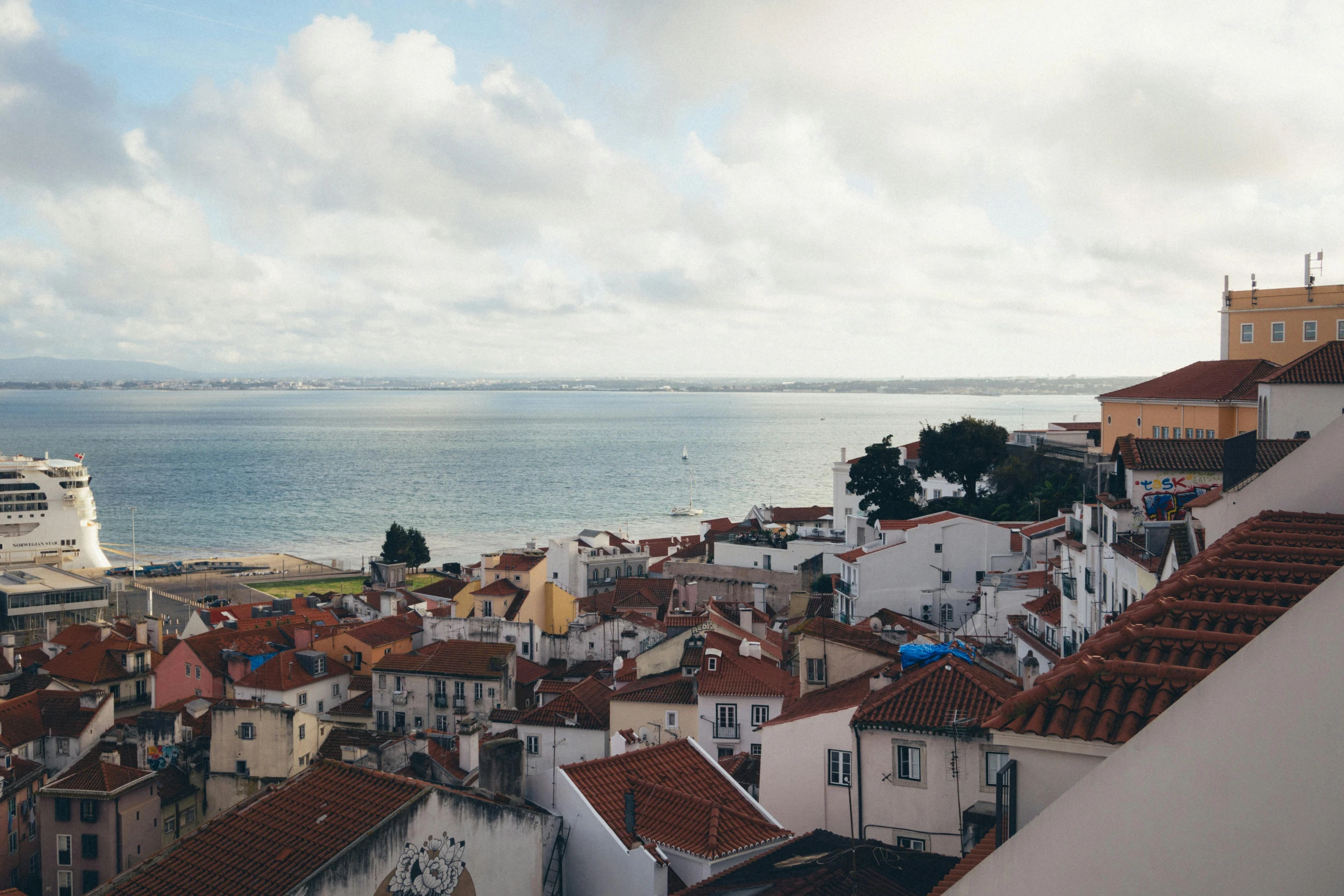 there is a small town overlooking the ocean