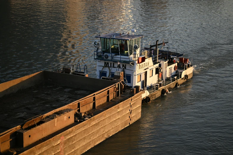 a tugboat that is floating on the water