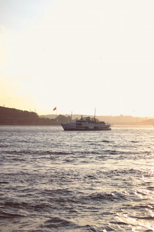 a large boat sailing across a body of water