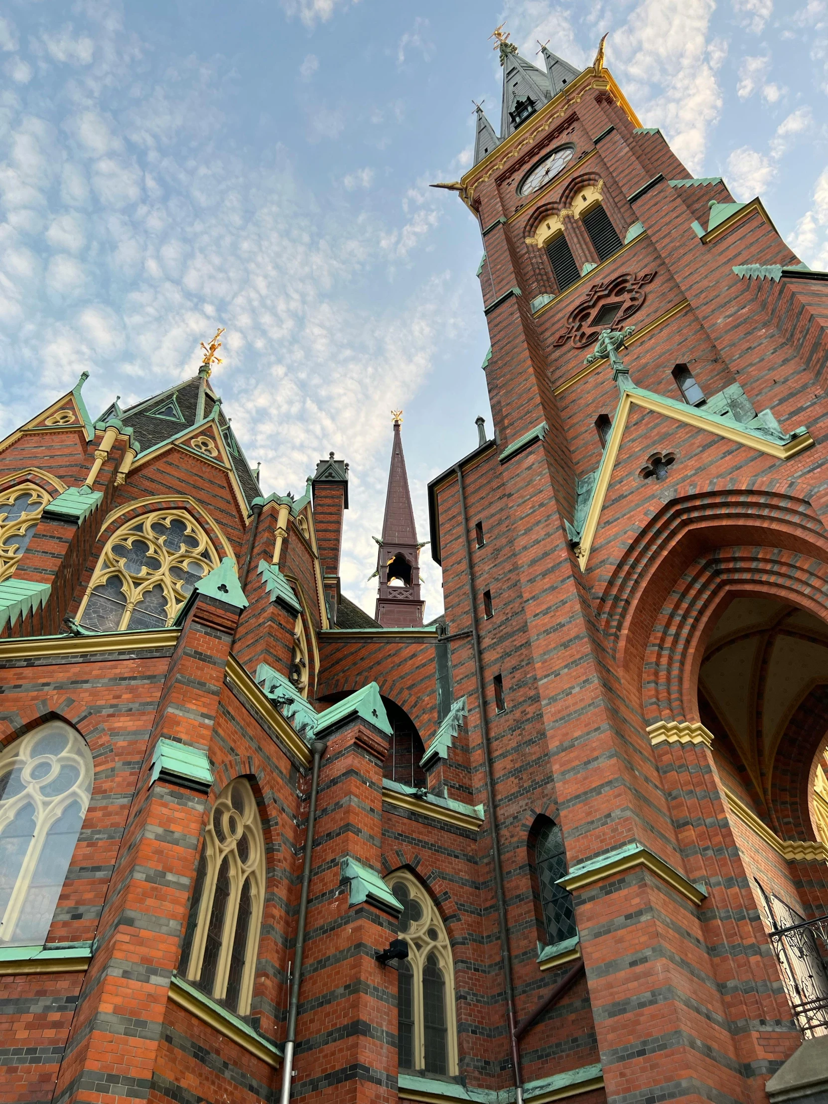 the building with two towers is red brick