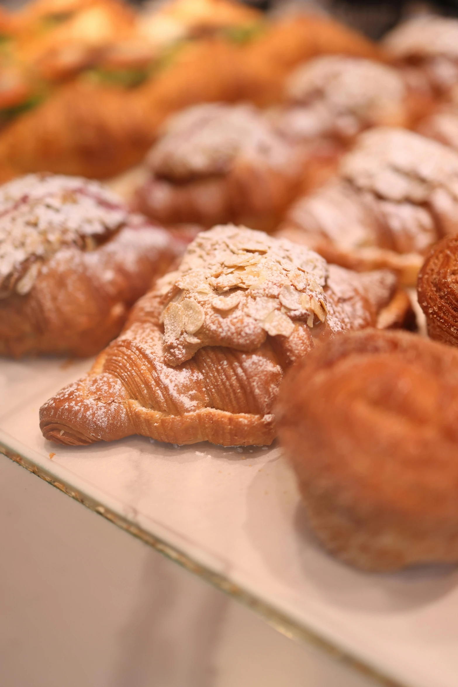 a tray of pastries sitting on a counter