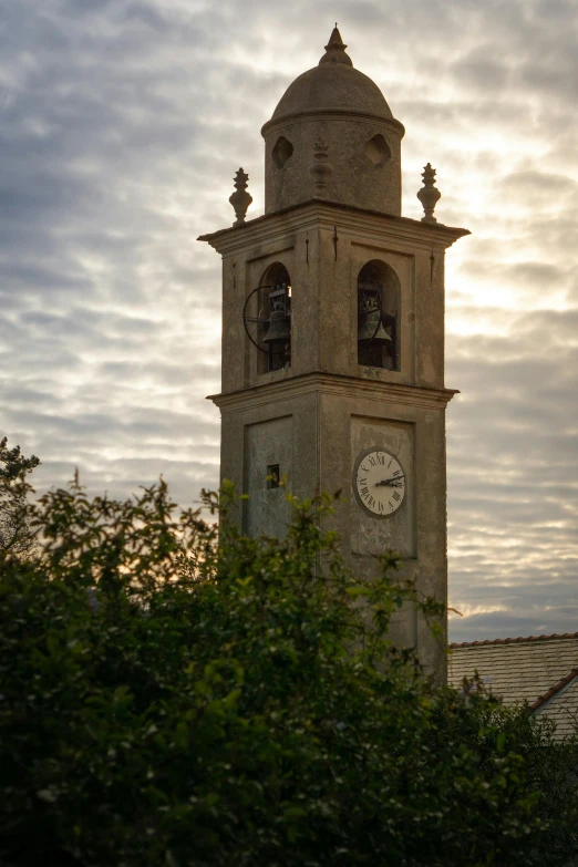 a large tall clock tower with clocks at the top