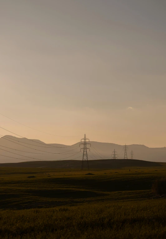 the power lines are all connected to the mountains