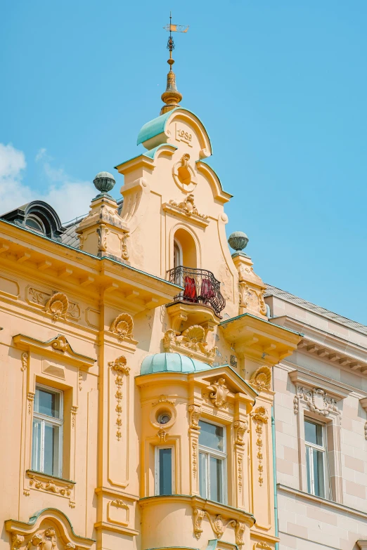 a building with some windows and an ornate tower