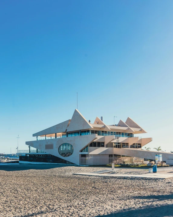 a beach with a building on the side of it