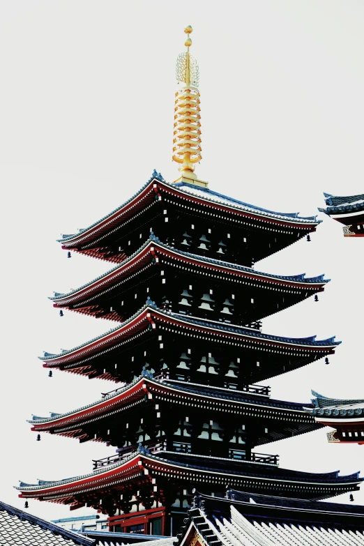 a tall pagoda is made up of many windows