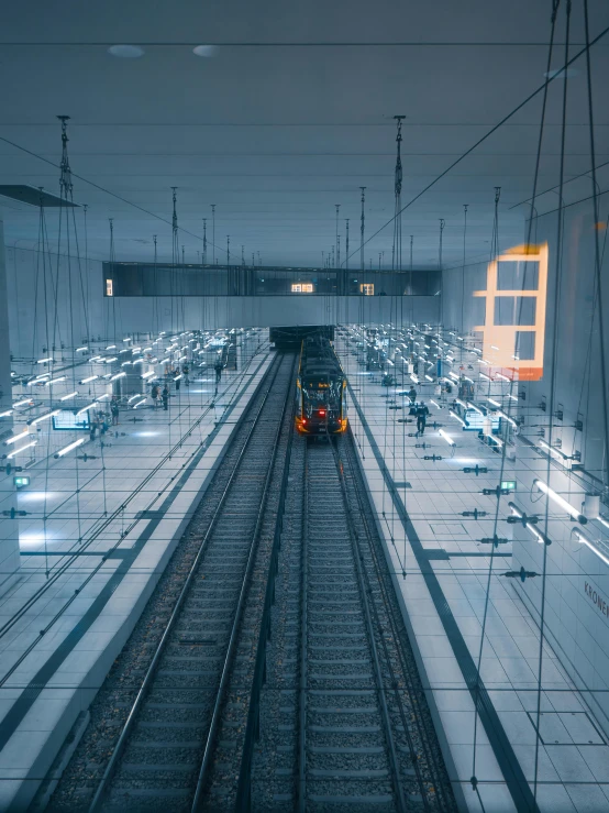 a train traveling through a tunnel covered in snow