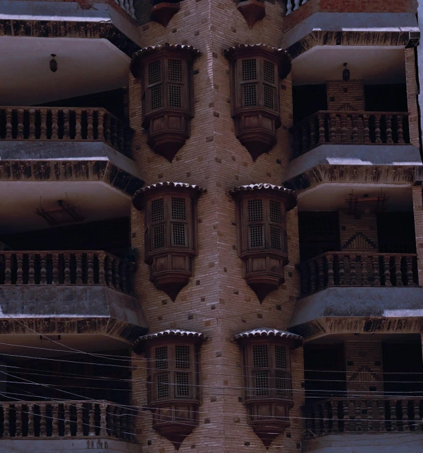 a building with multiple levels and balconies