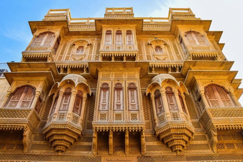 the intricate architecture of an old building that is made out of stone