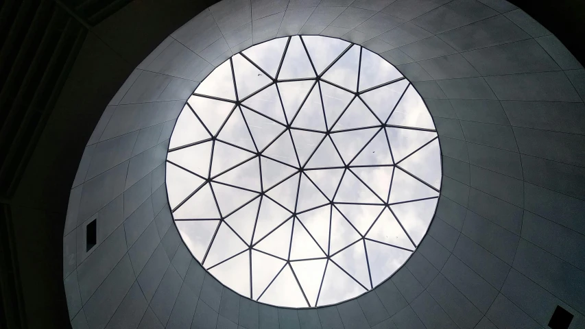 the ceiling is covered with triangular shapes