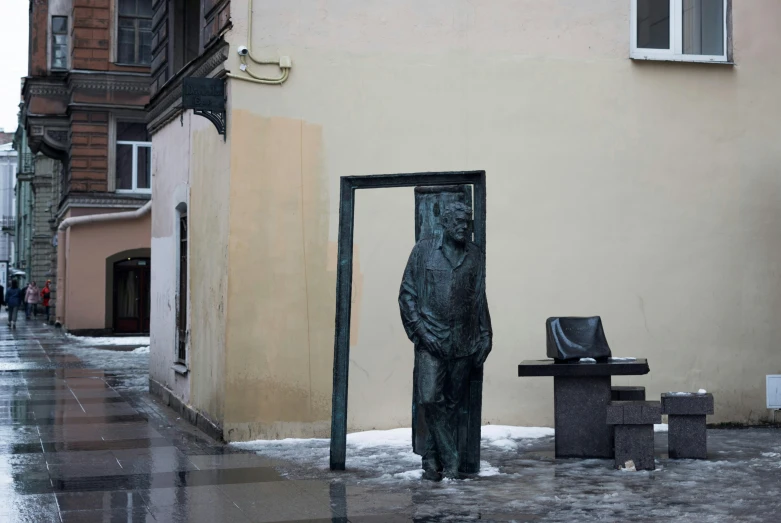 a large statue on the side of a building