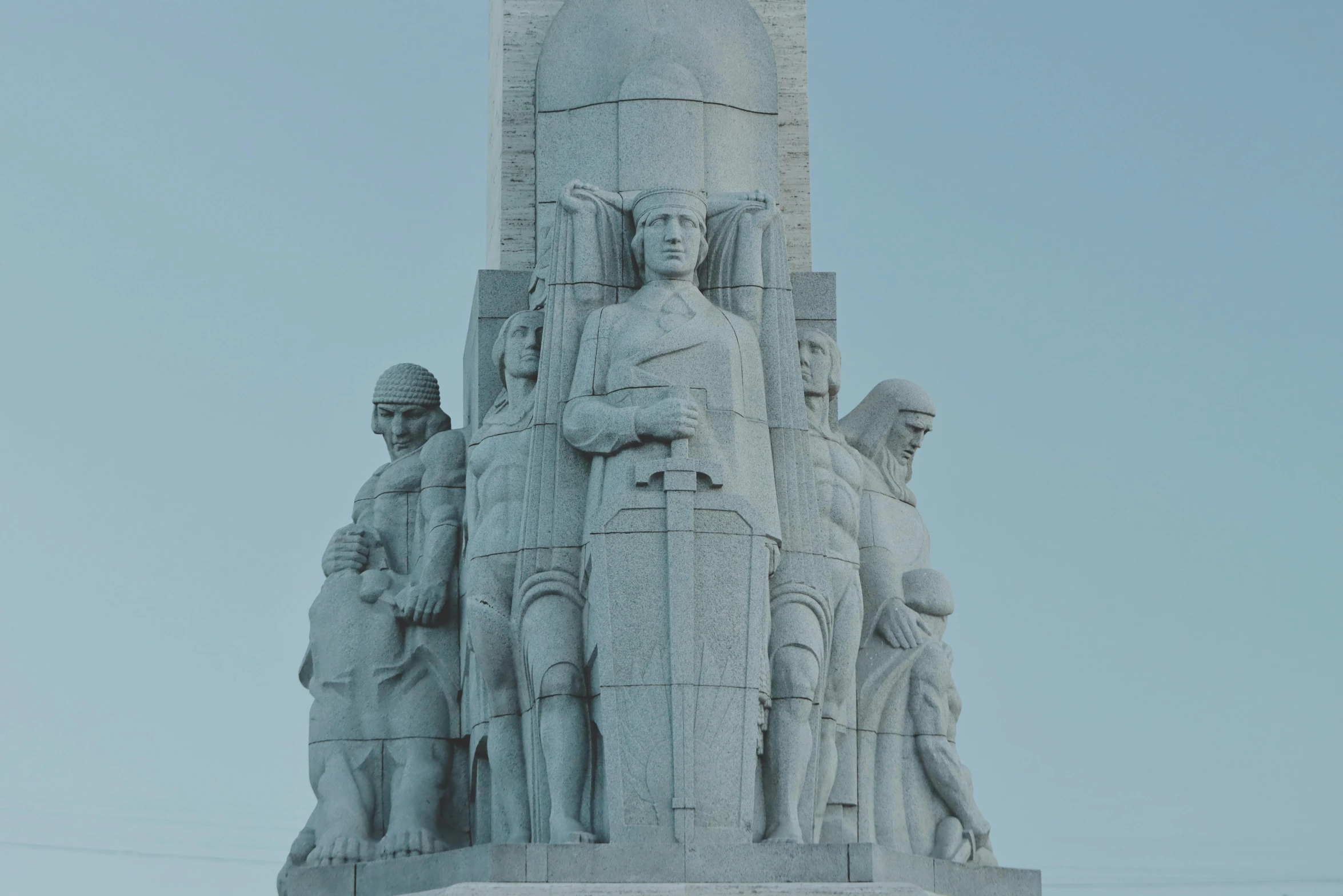 this is an image of statue at the top of a tower