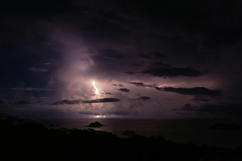 a dark night with several lighting effects in the sky