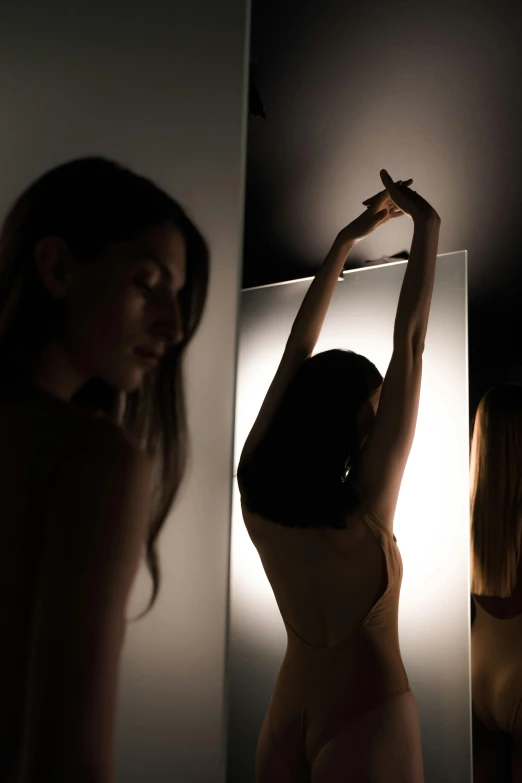 a young woman is shown brushing her hair