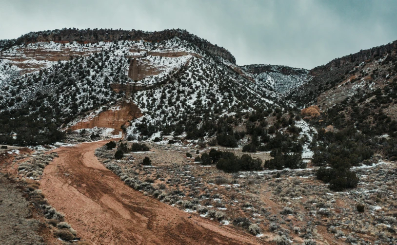 there is snow on the top of this mountain