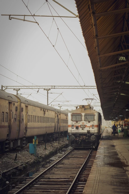 two trains that are parked next to each other