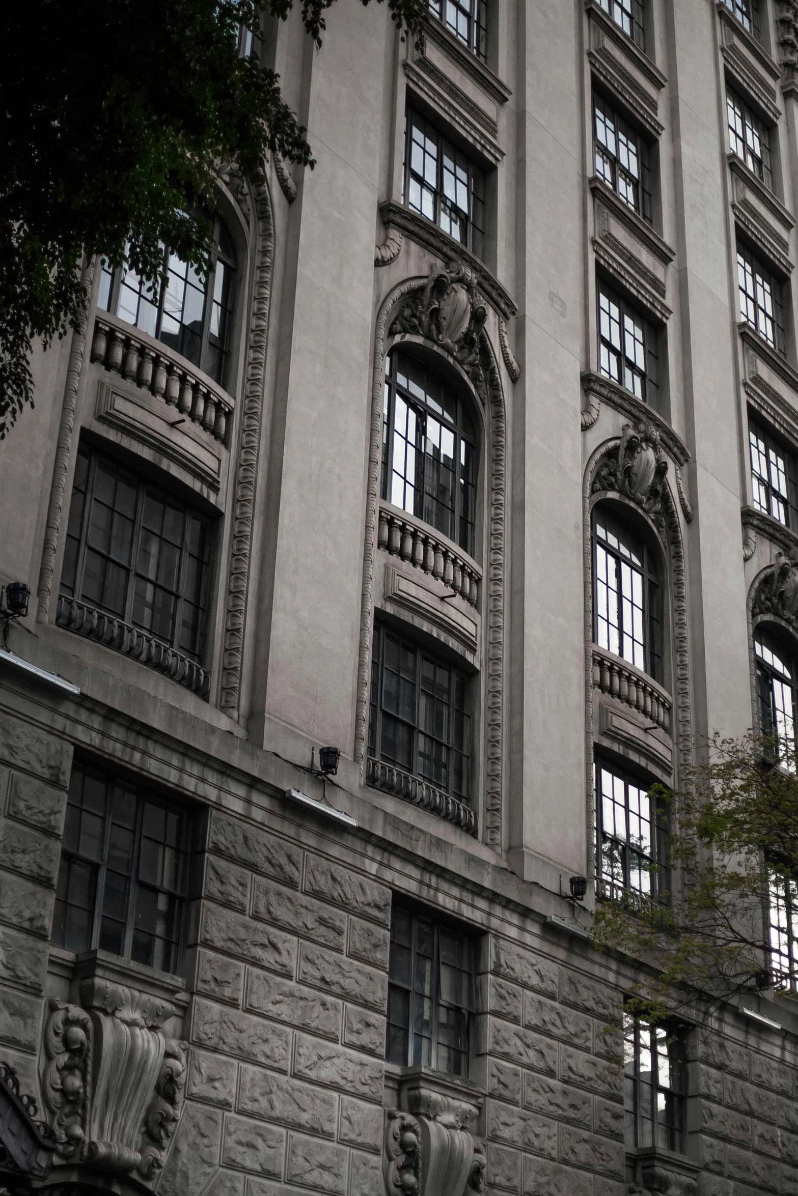 the facade of a building with multiple windows