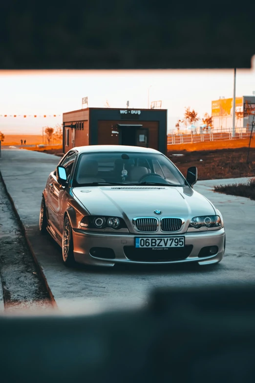 the car is parked on the side of a road