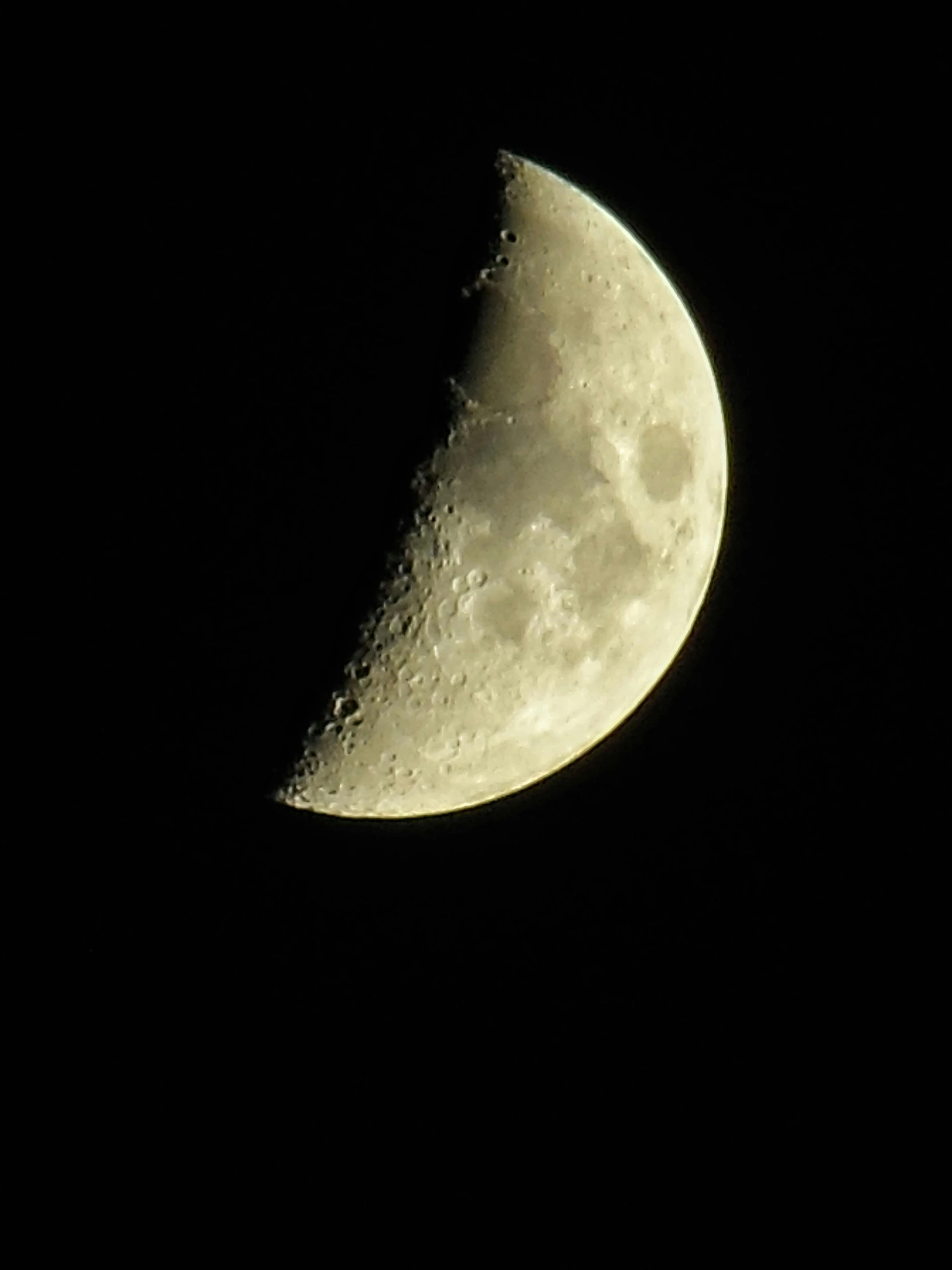 a crescent in the sky with the moon showing