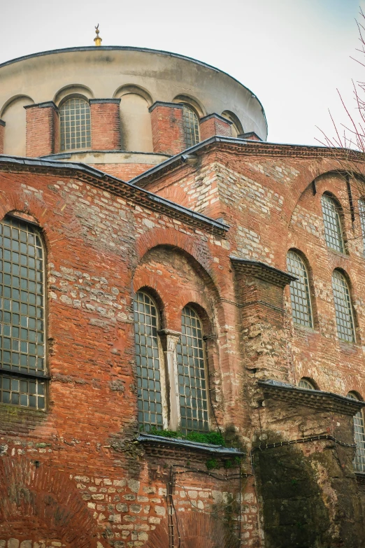 an old building is made out of red brick