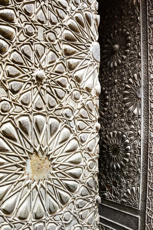 intricate stucco work in the walls of an old building