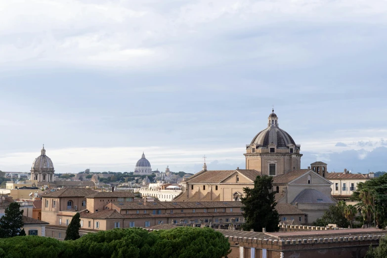 looking across an old city, roofs, and chimneys