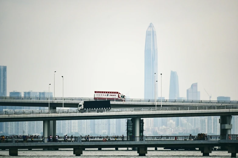 a large freeway with many cars driving along it