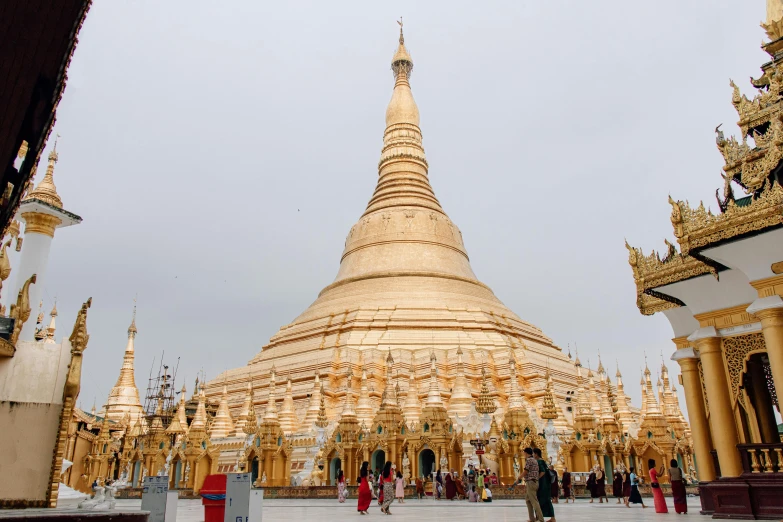 a very tall spire structure with golden color