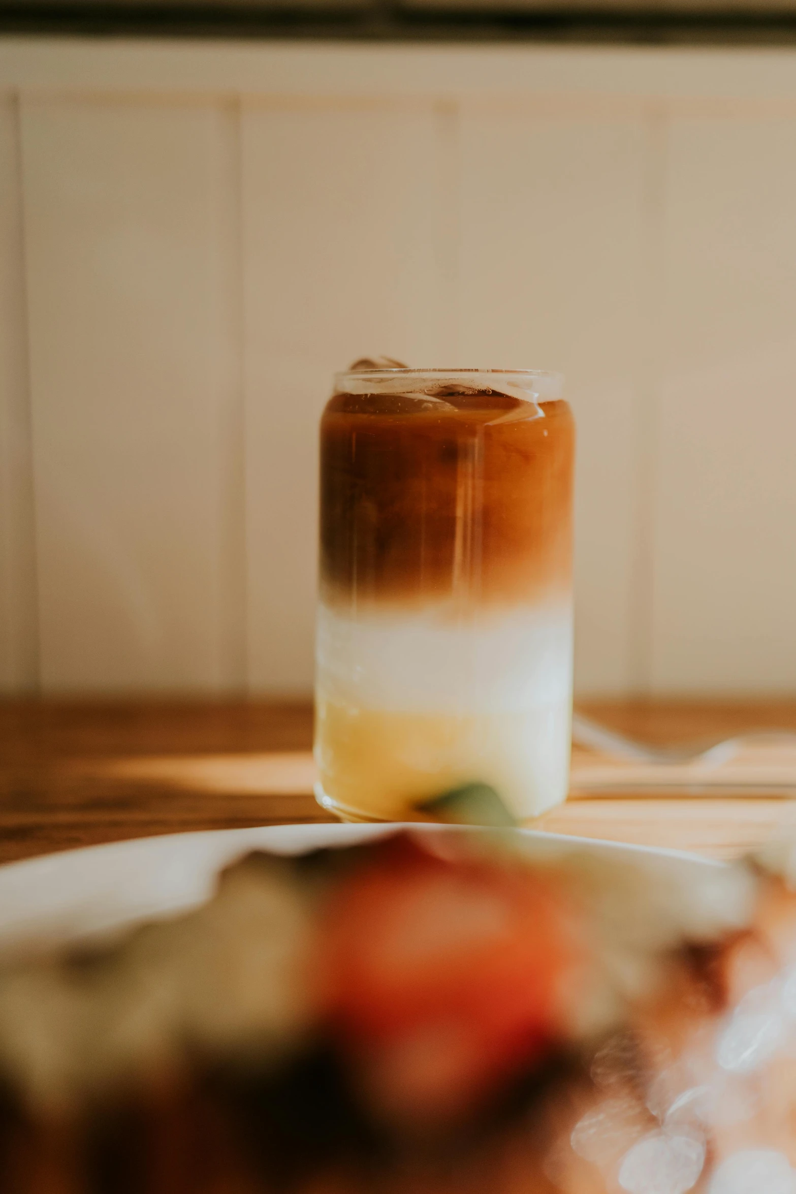 a small glass container that is sitting on a table