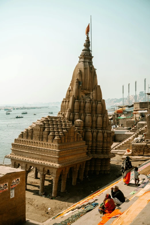 an elaborate sand sculpture in the middle of a beach