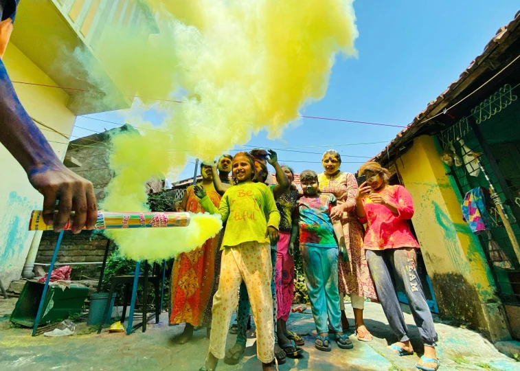 the people are watching some smoke release