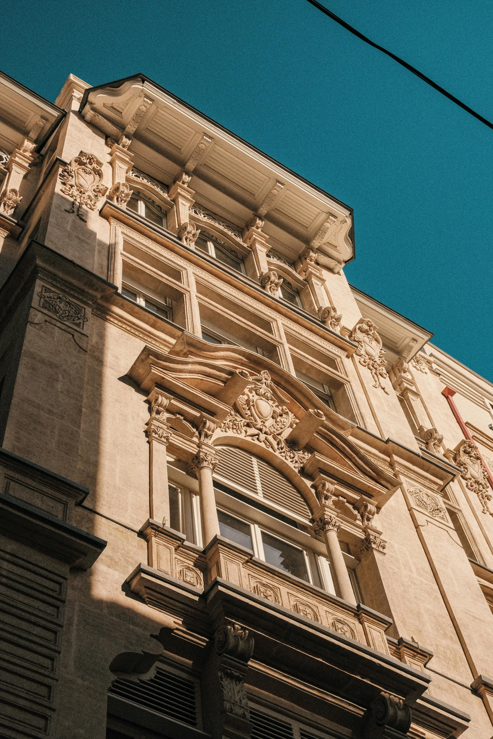 a building has been pographed from below the roof