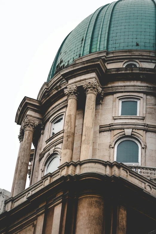 a large dome on top of a stone building