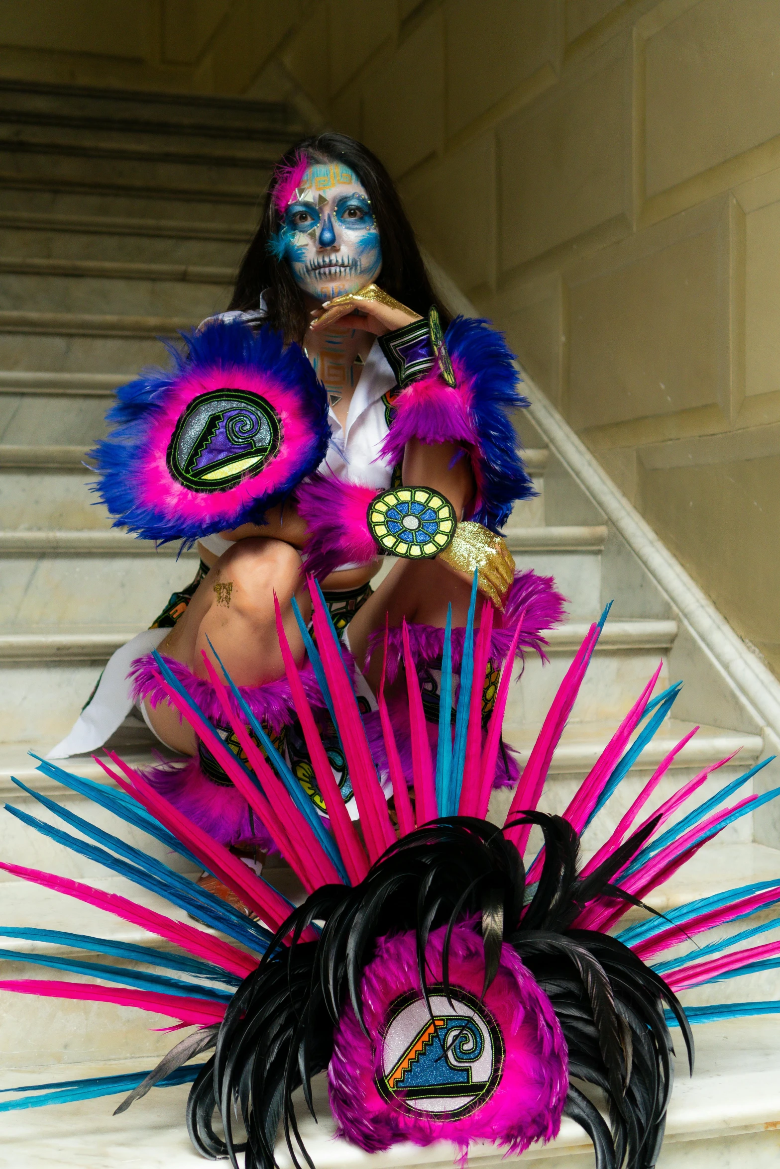 a person sitting on steps in a costume